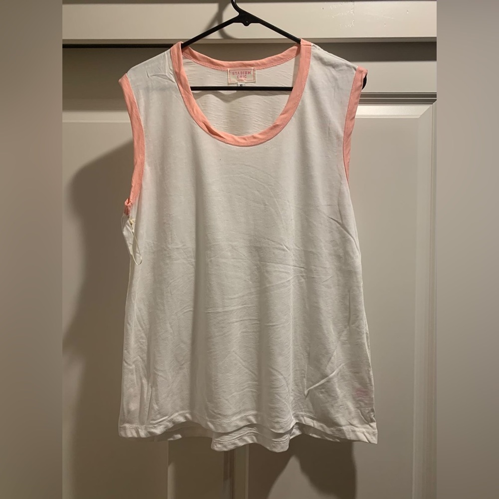 Muscle tee with light pink detail!